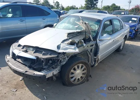 2002 Lincoln Continental из США, поврежденный, VIN 1LNHM97V32Y655654